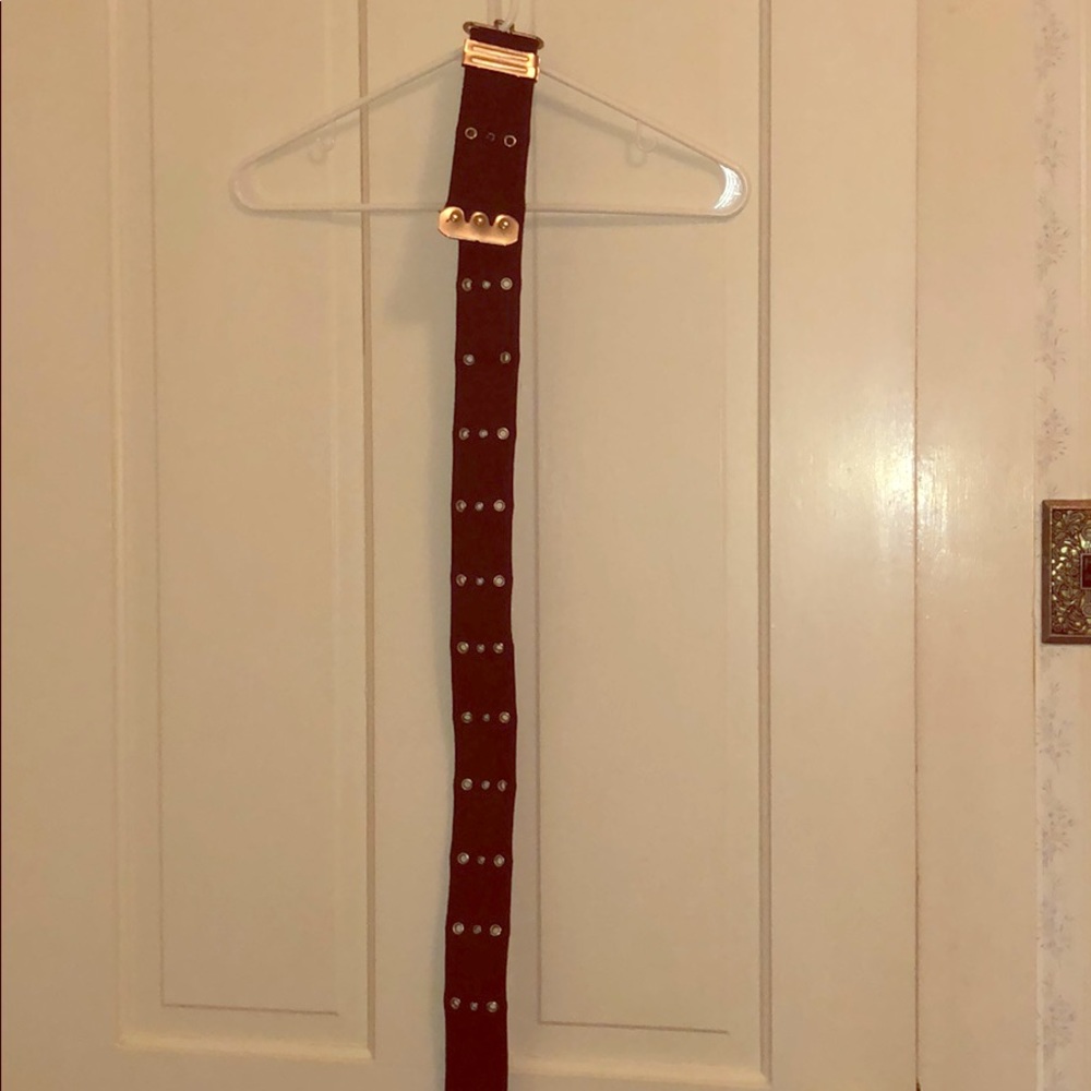 Black belt with holes. One size ‼️MAKE AN OFFER‼️ Never worn in great condition.